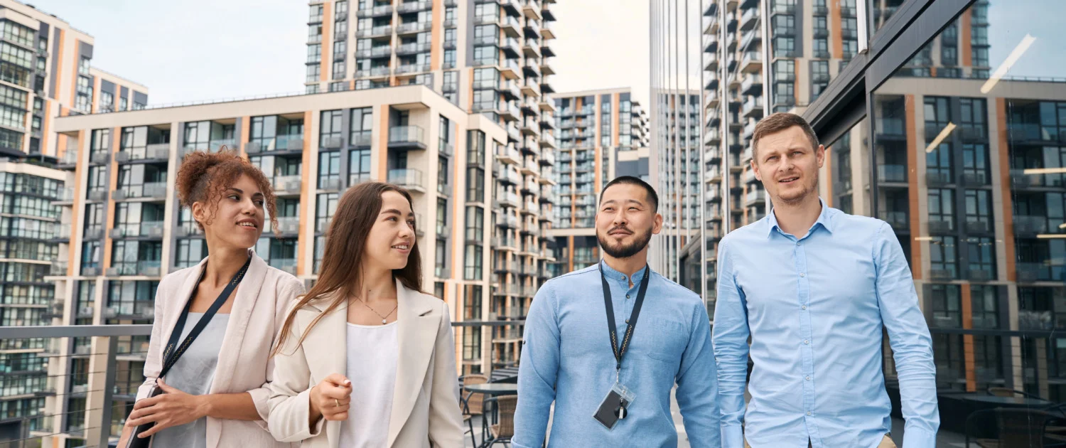 Corporate workers strolling outside during lunch break